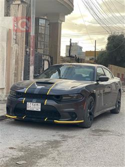 دۆج چارجەر
